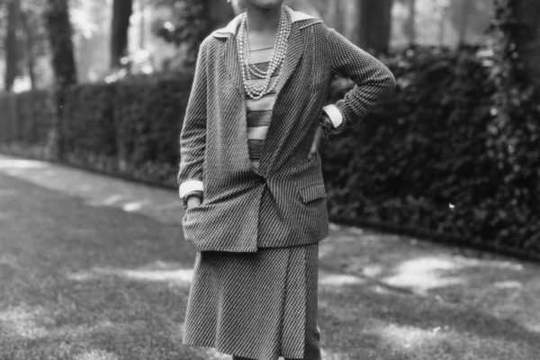 30th May 1929:  Influential French fashion designer Coco Chanel, real name Gabrielle Bonheur Chanel, (1883 - 1971) modelling a Chanel suit at Fauborg, St Honore, Paris.  (Photo by Sasha/Hulton Archive/Getty Images)